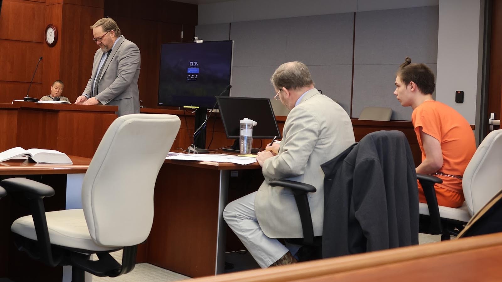 Natrona County District Attorney Dan Itzen, center, questions Casper Police Detective Leonard Jacobs on Thursday in Casper Circuit Court.