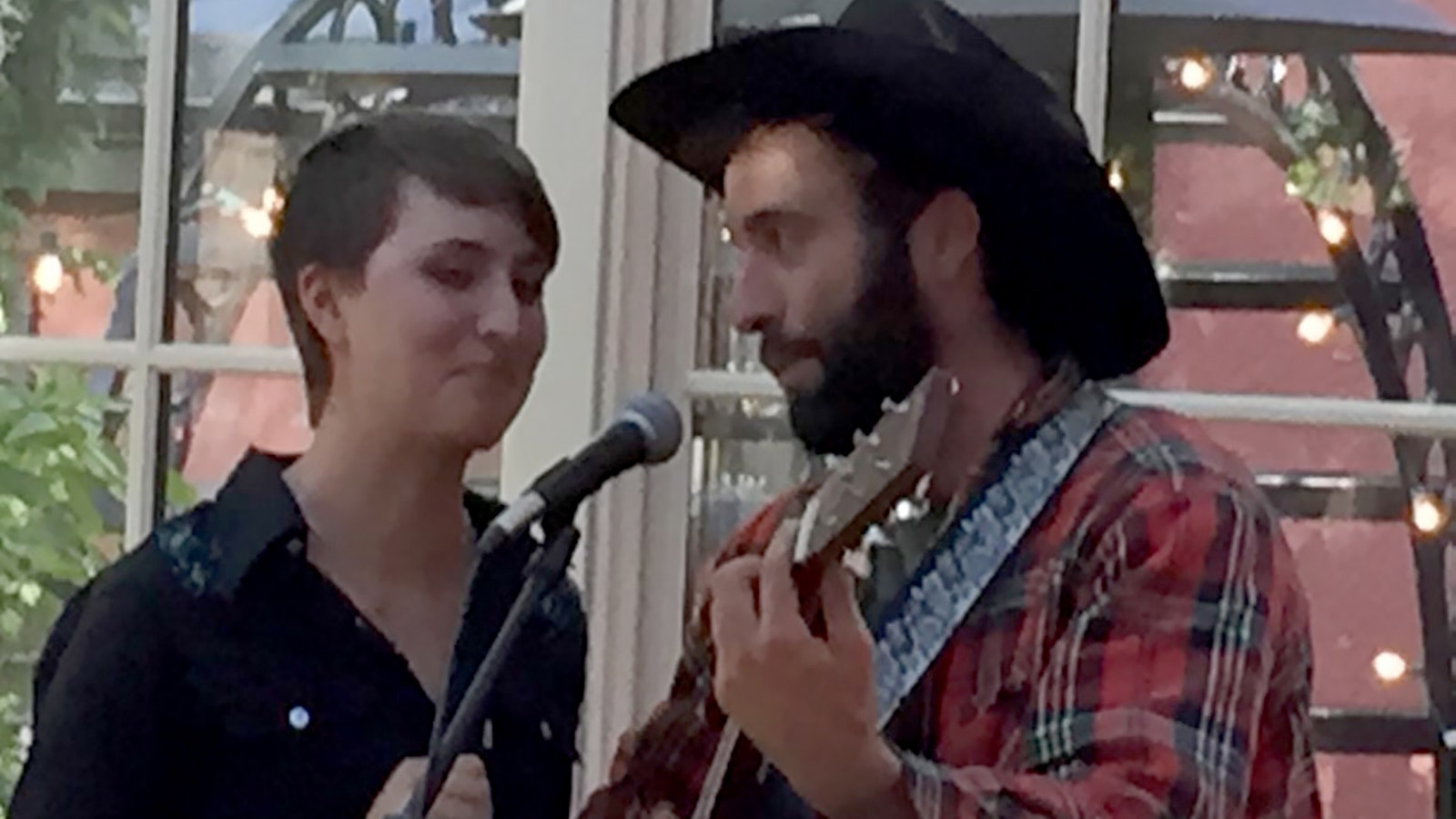 Luke Bell sings with his sister Jane Bell in 2016.