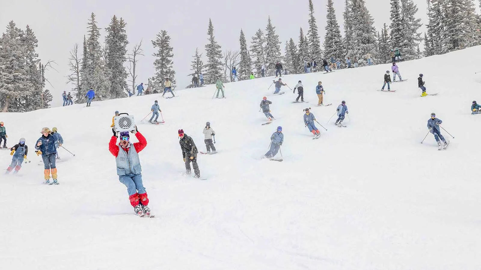 A skier gets a facefull of powder during a run at Jackson Hole Mountain Resort in this file photo.