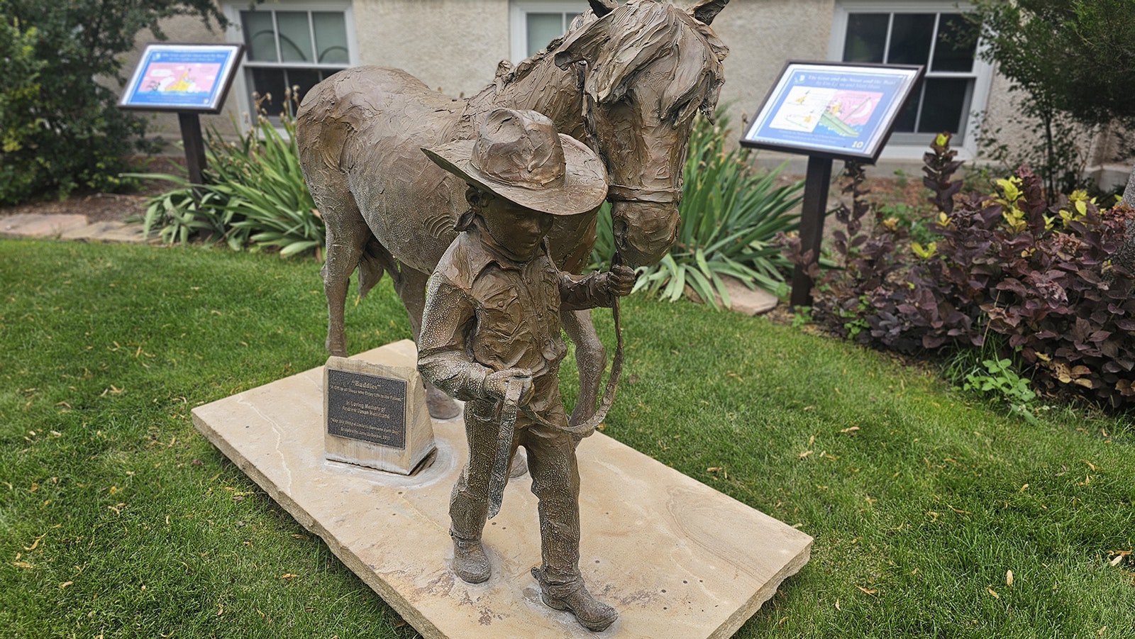 A bronze sculpture outside the Lusk Carnegie Library.