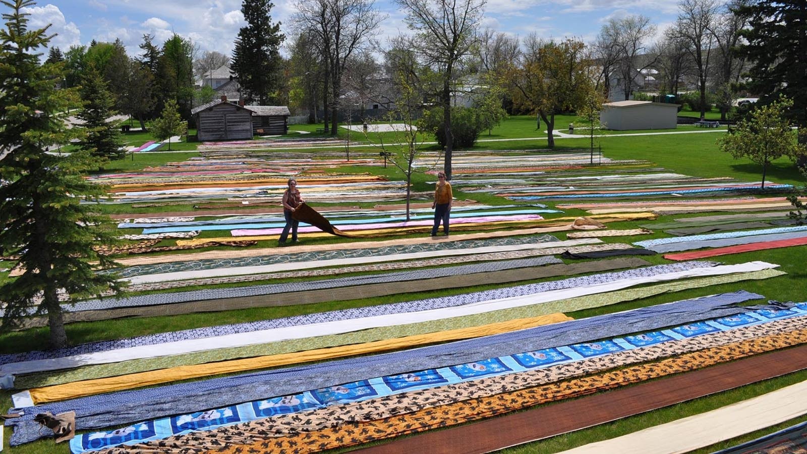 This photo helped spark the Wyoming Quilt Trail, which began after all this fabric was put out to dry after a devastating flood in 2015.