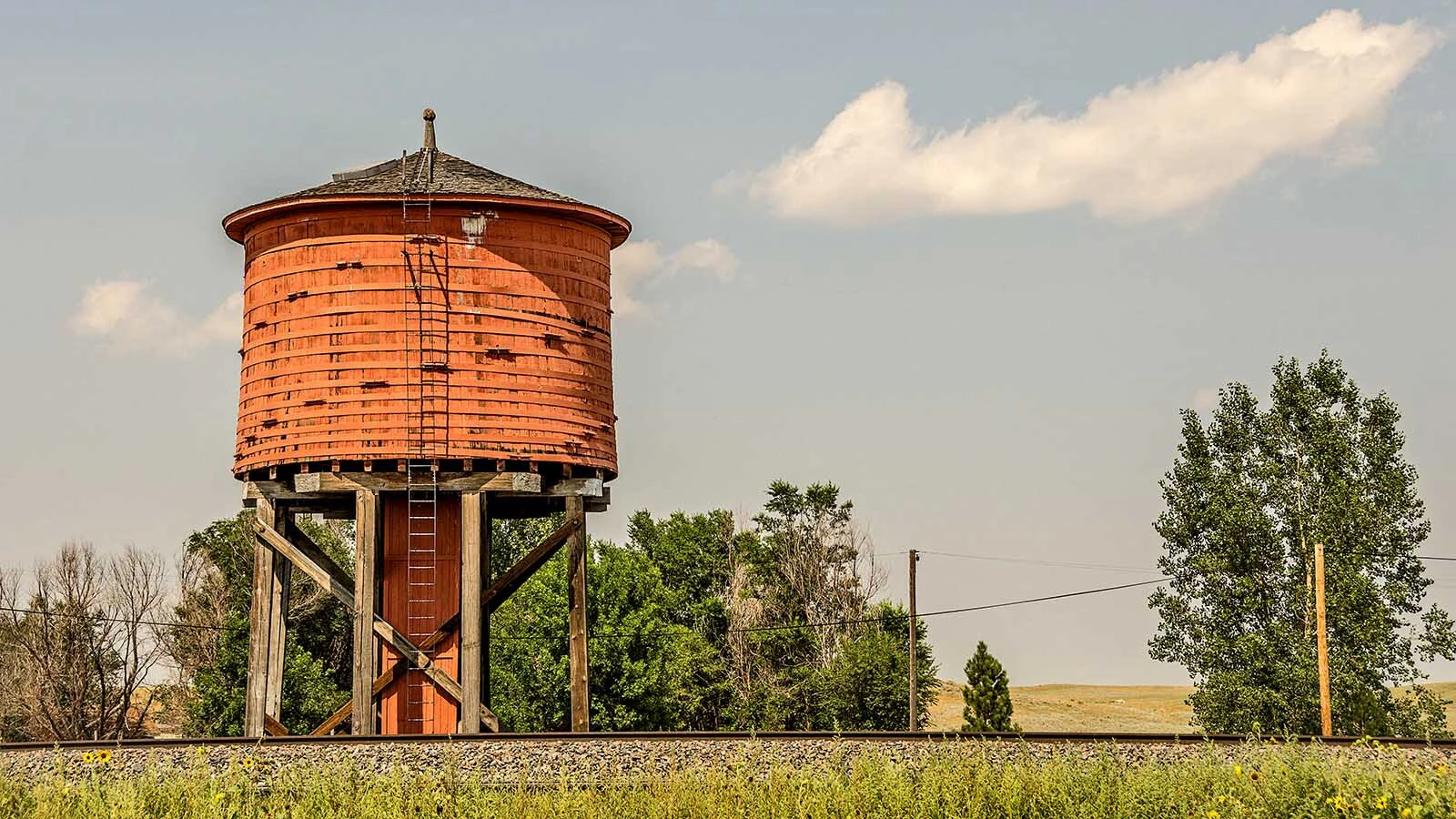 The redwood water tower in Lusk was built in 1886 to keep steam engines running between Wyoming and South Dakota. While the engines are gone, the tower endures 140 years after it was built and is one of six such relics still standing in the United States.