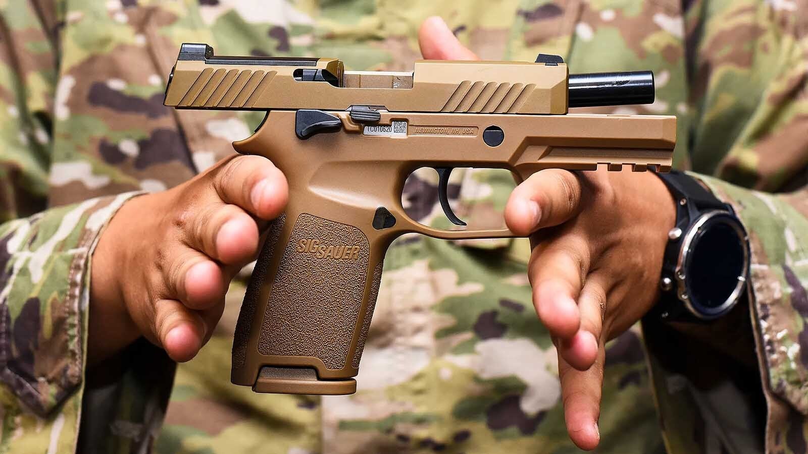 A day after the death of an F.E. Warren Air Force Base airman on Sunday, the Air Force suspended the use of the M18 modular handgun. A Wyoming gunsmith said the guns have a history of reported unintentional firings, which could be due to an ill-fitting striker design.