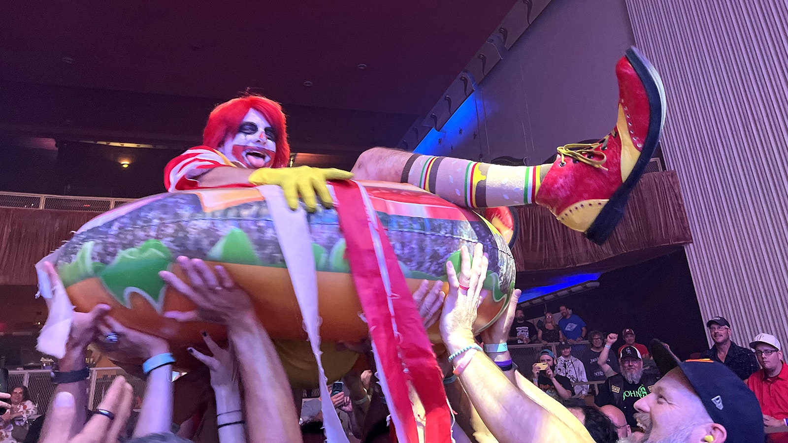 Mac Sabbath frontman Ronald Osbourne crowd surfs on an inflatable hamburger during the band’s concert Wednesday at The Lincoln theater in Cheyenne.