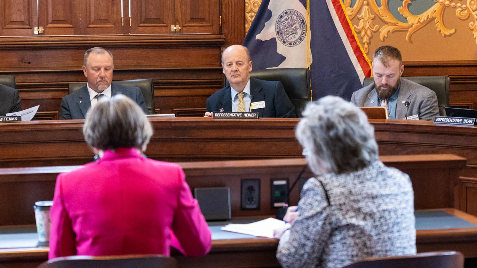 Reps. Chip Neiman, from left, Scott Heiner and Jeremy Haroldson during a Management Council meeting on April 1, 2026, in the Historic Supreme Court Chamber at the Wyoming State Capitol in Cheyenne, Wyoming.