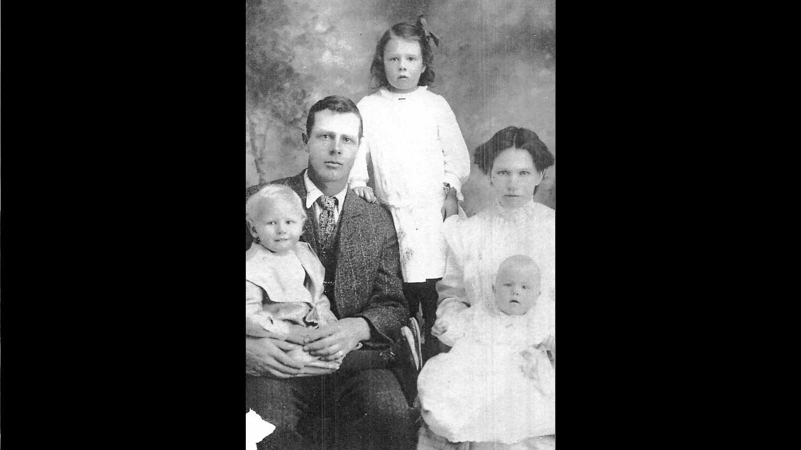 Earl Newton was a friend of Buffalo Bill Cody and had been a cowboy, miner, stage driver, rancher, and sheep man. He also was lonely. In 1902, he married a mail-order bride, Eliza Bushnell, of Cherokee, Iowa. She arrived by train and their were married by Judge M.O. Newton right away. Here they are after having three kids.