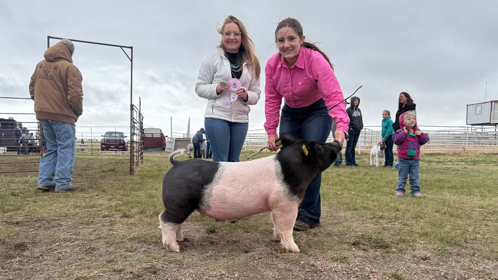 Blair Sanchez and her 4-H hog Slate pose for a poster shot to be used at the Laramie County Fair.