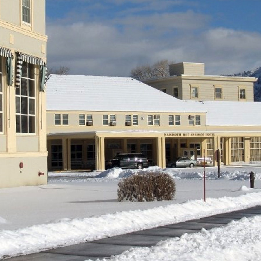Colder temperatures and above-average snowfall have slowed progress on a new wastewater treatment system for the Mammoth Hot Springs Hotel, prompting the hotel to cancel its planned April 28 opening.
