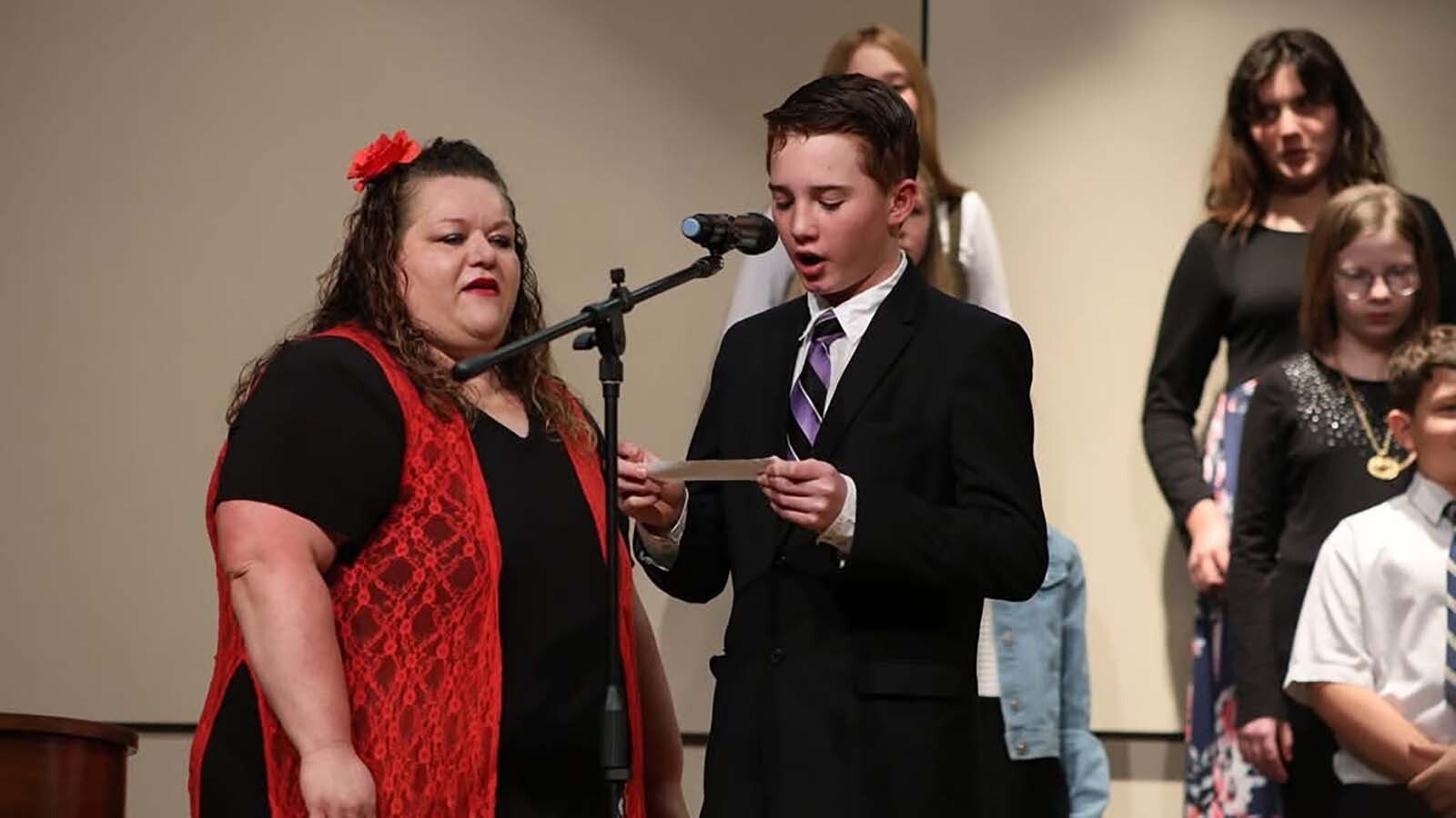 Music teacher Mandie Asay observes a performance by one of her students.