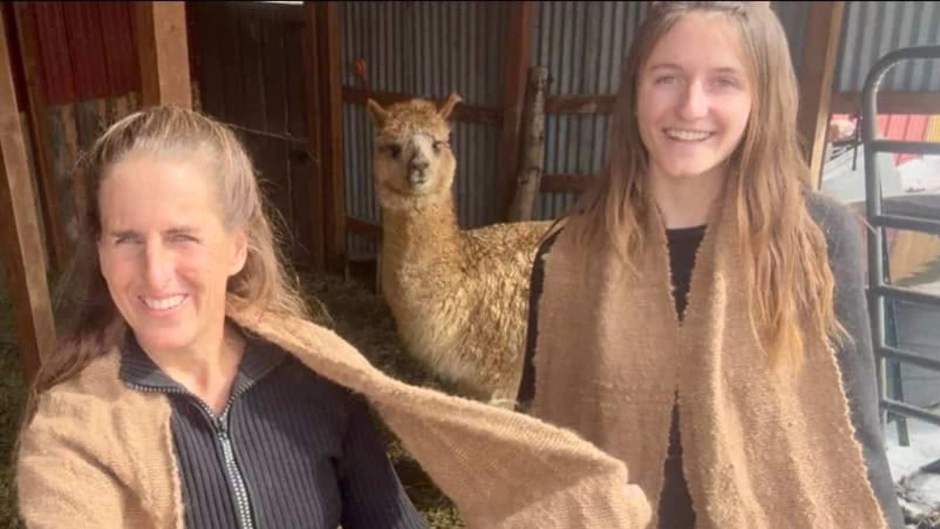 Mariann and Maria Eckendorf with alpaca scarves.