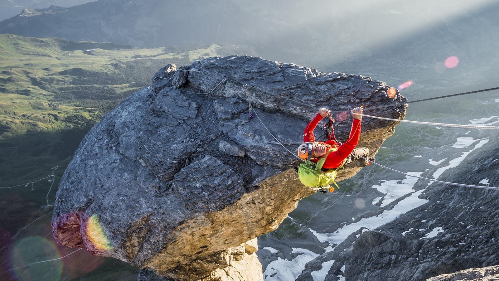 Jenkins pulls himself along a rope earlier in his climbing career.