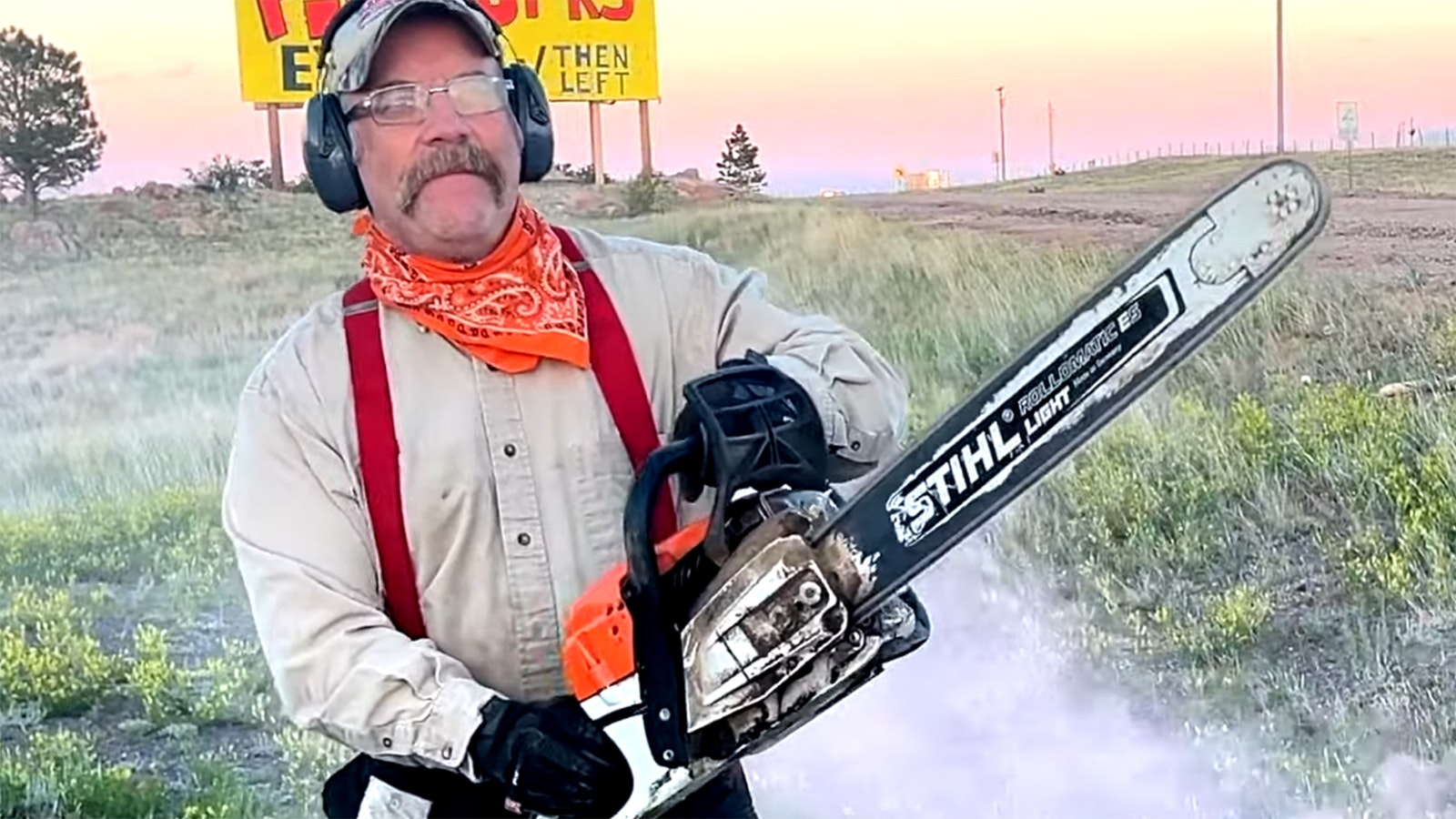 Cowboy State Daily outdoors writer Mark Heinz plays "The Star Spangled Banner" on his Stihl MS 261 chainsaw.