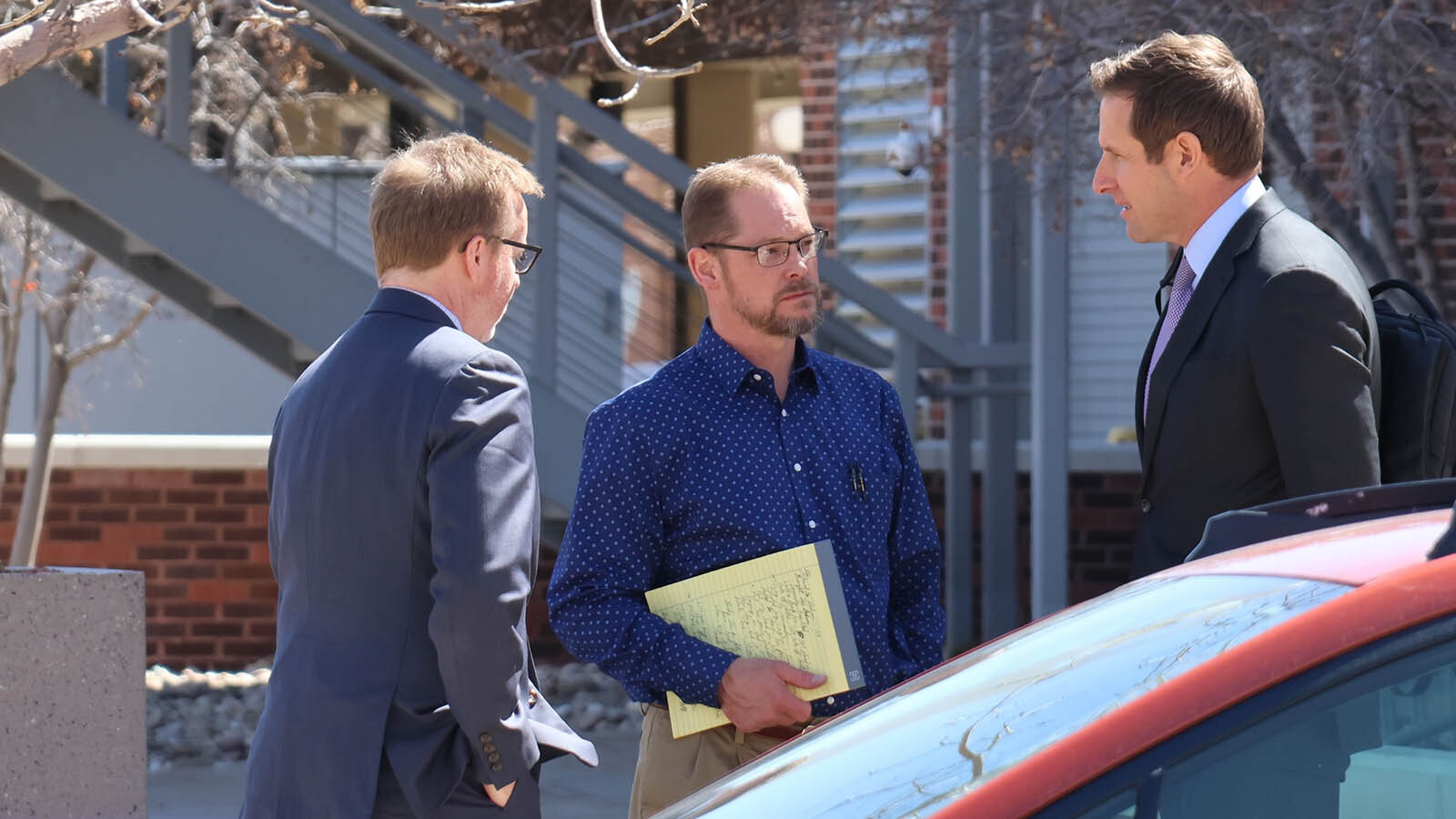 Steven Marler, center, talks with his attorneys, John Hummel, left, and Devon Petersen after the prosecution rested its case.