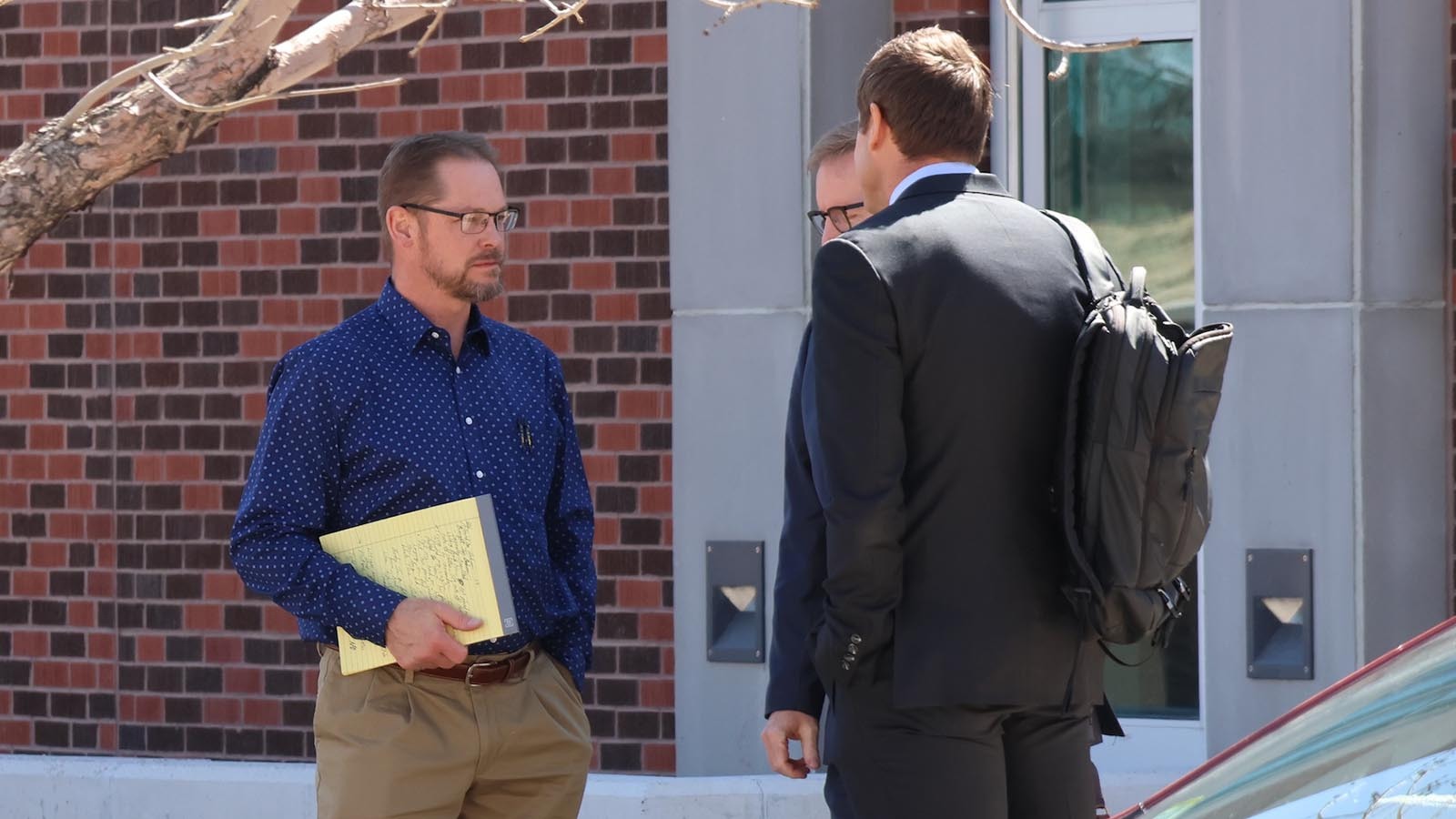 Steven Marler, left, consults with his attorneys following a morning court session last week.