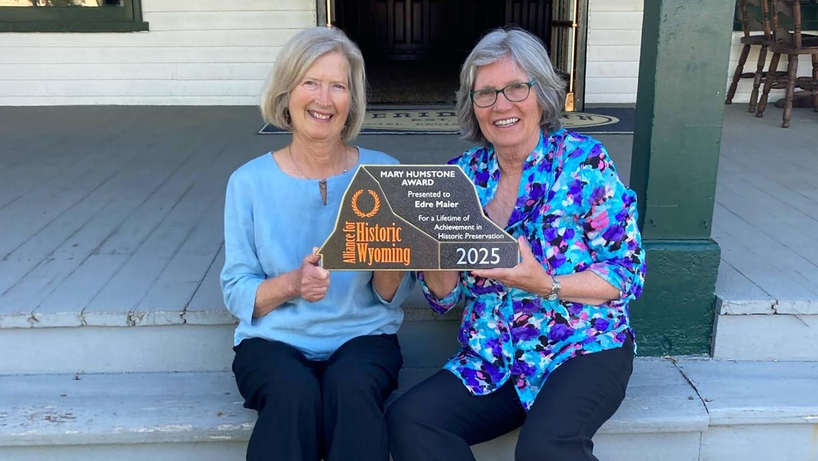 Mary Humsford, left, and Edre Maier with Maier's Humstone Historic Preservation Award for Lifetime Achievement for decades of preservation efforts, including the Sheridan Inn.