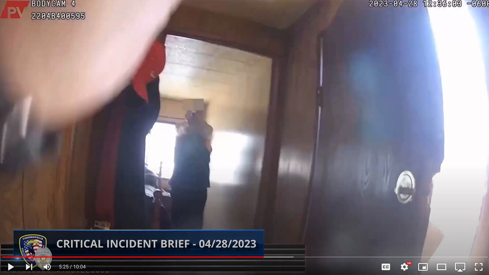 In this image from Thermopolis Police Sgt. Mike Mascorro's body cam on April 28, 2023, shows Mascorro being confronted by an armed Buck Laramore after breaking into Laramore's home intending to arrest him.