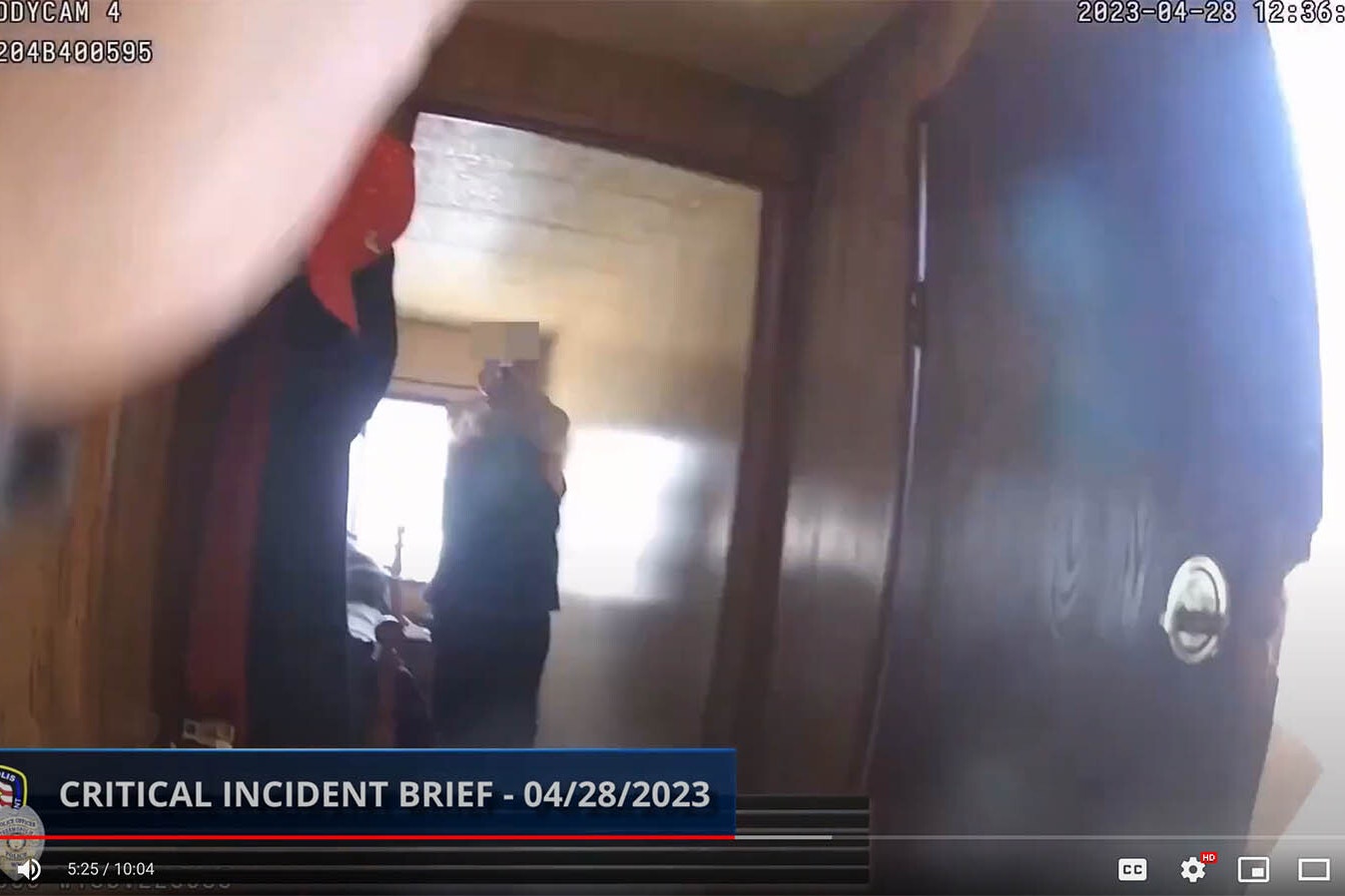In this image from Thermopolis Police Sgt. Mike Mascorro's body cam on April 28, 2023, shows Mascorro being confronted by and armed Buck Laramore after breaking into Laramore's home intending to arrest him.