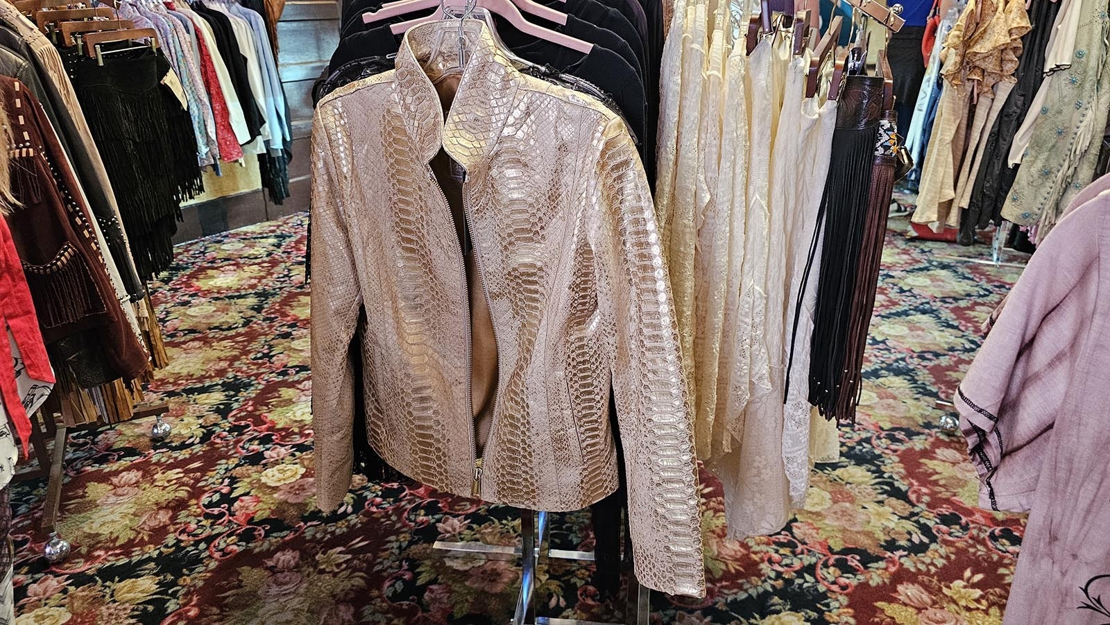 There's only two or three of these snakeskin jackets in America. One of them is in the Hotel Irma's gift shop.