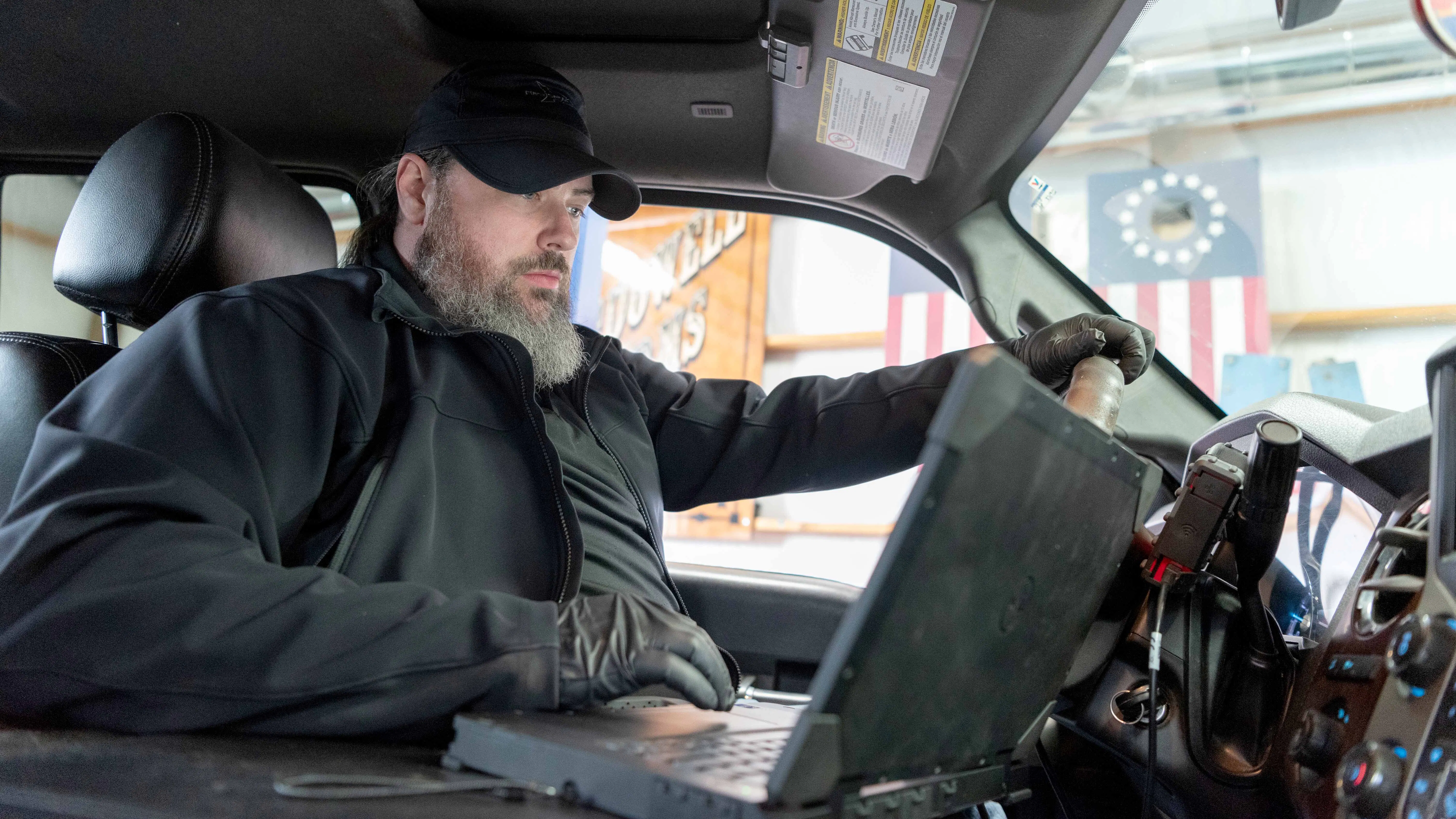 Matt Geouge diagnoses an electrical sensor problem with a truck.