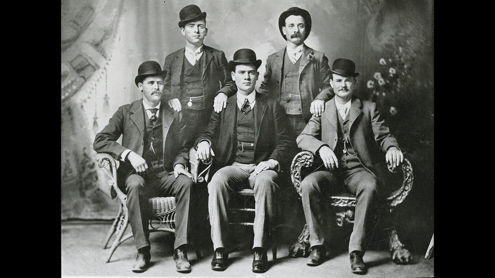 The famous Wild Buch of Butch Cassidy, seated right.