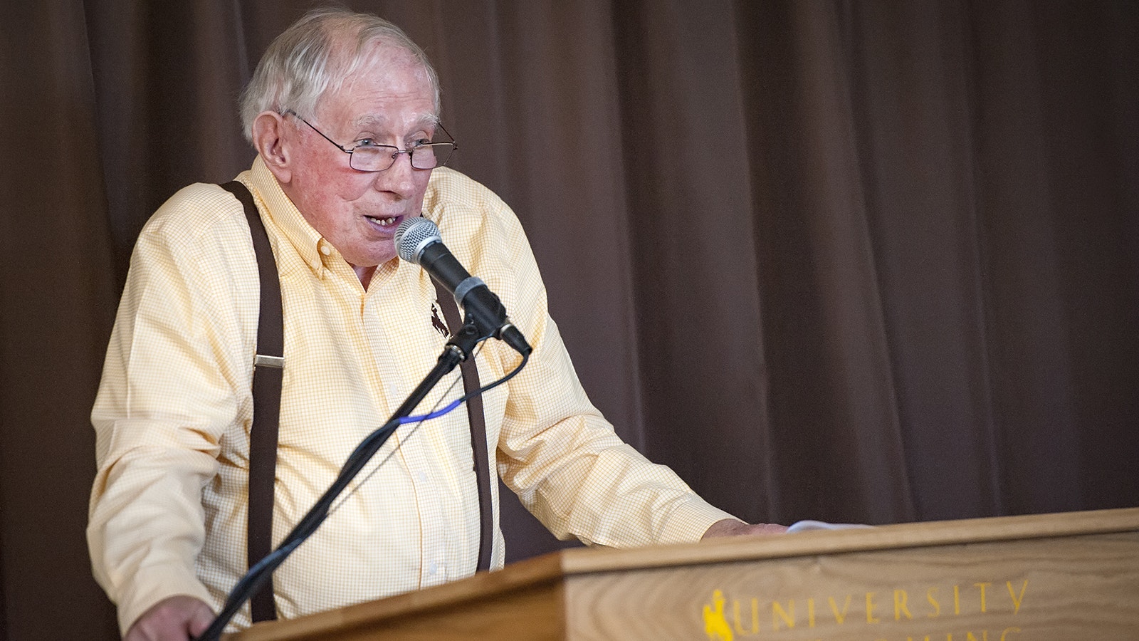 Maury Brown speaks at the dedication ceremony for the Maury Brown Court at the University of Wyoming.