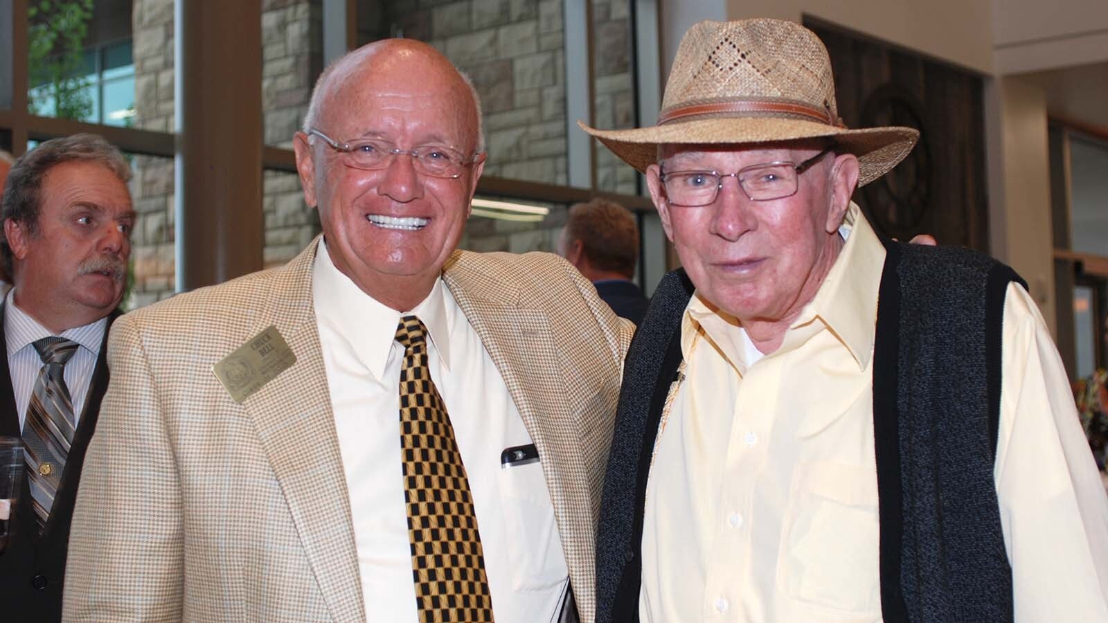 Maury Brown, right, with former assistant UW basketball coach Chuck Bell at the UW Athletics Hall of Fame in 2015.