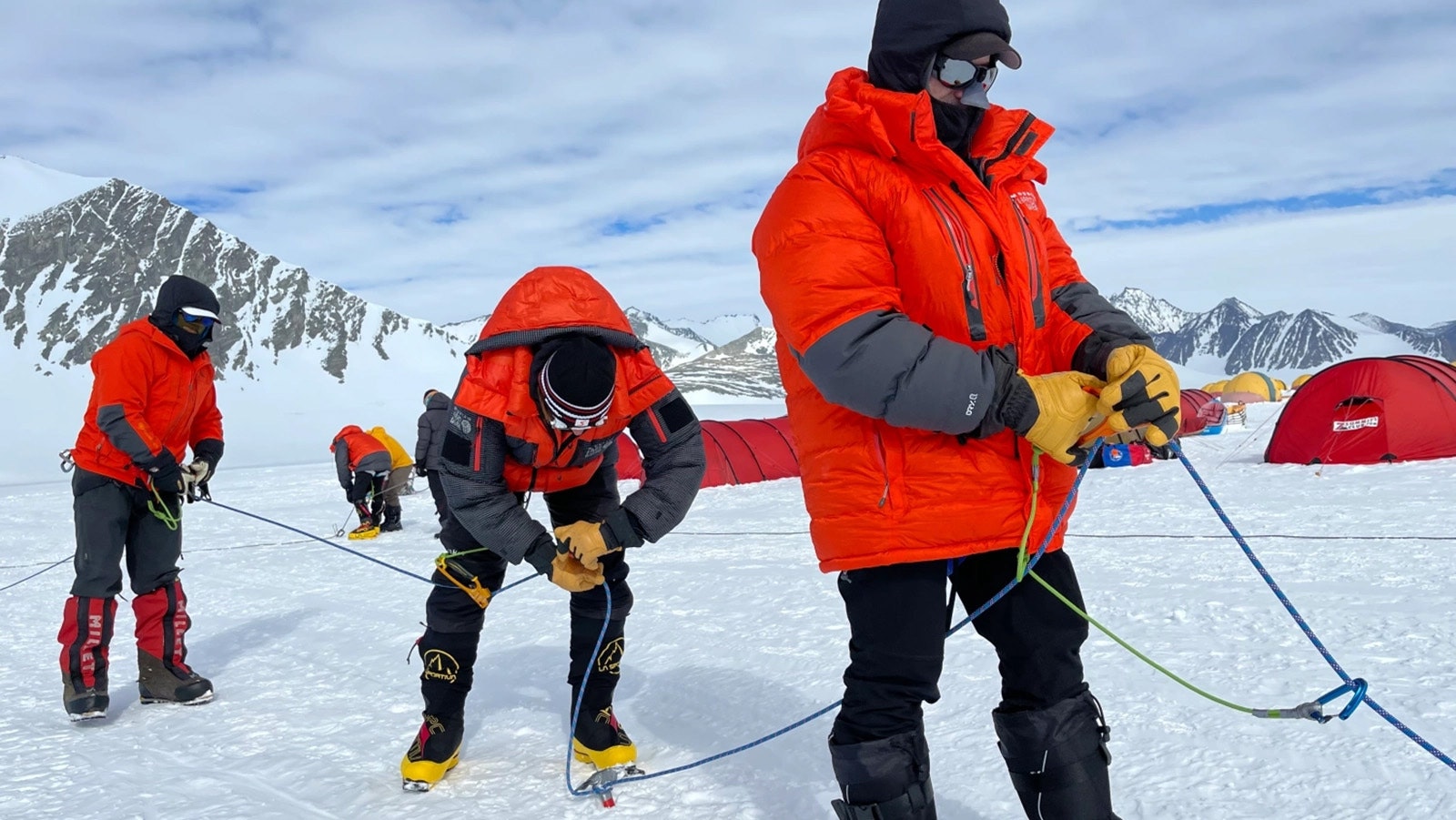 The team practices techniques while waiting for weather to clear enough to fly to the base camp for their attempt to summit Mount Vinson.
