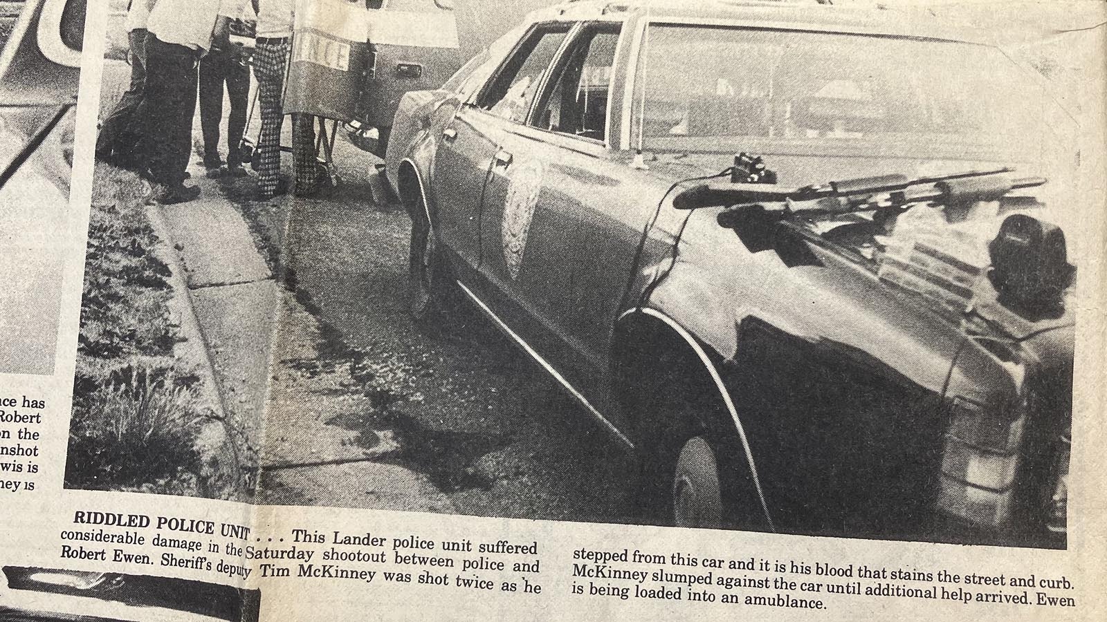 Blood from then Fremont County Sheriff’s Deputy Tim McKinney can be seen in a newspaper photo beside the Lander Police cruiser where he was shot and returned fire in 1977.