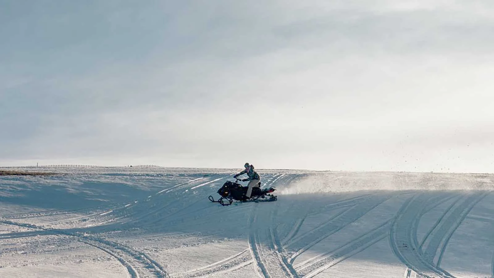 Cutting a snowmobile rail at Meadowlark Ski Lodge.