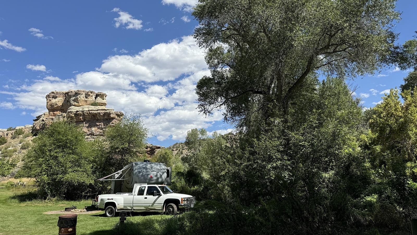 At Medicine Lodge Archaeological Site, a visitor has set up camp under the “Ship Rock” towards the outskirts of the park.