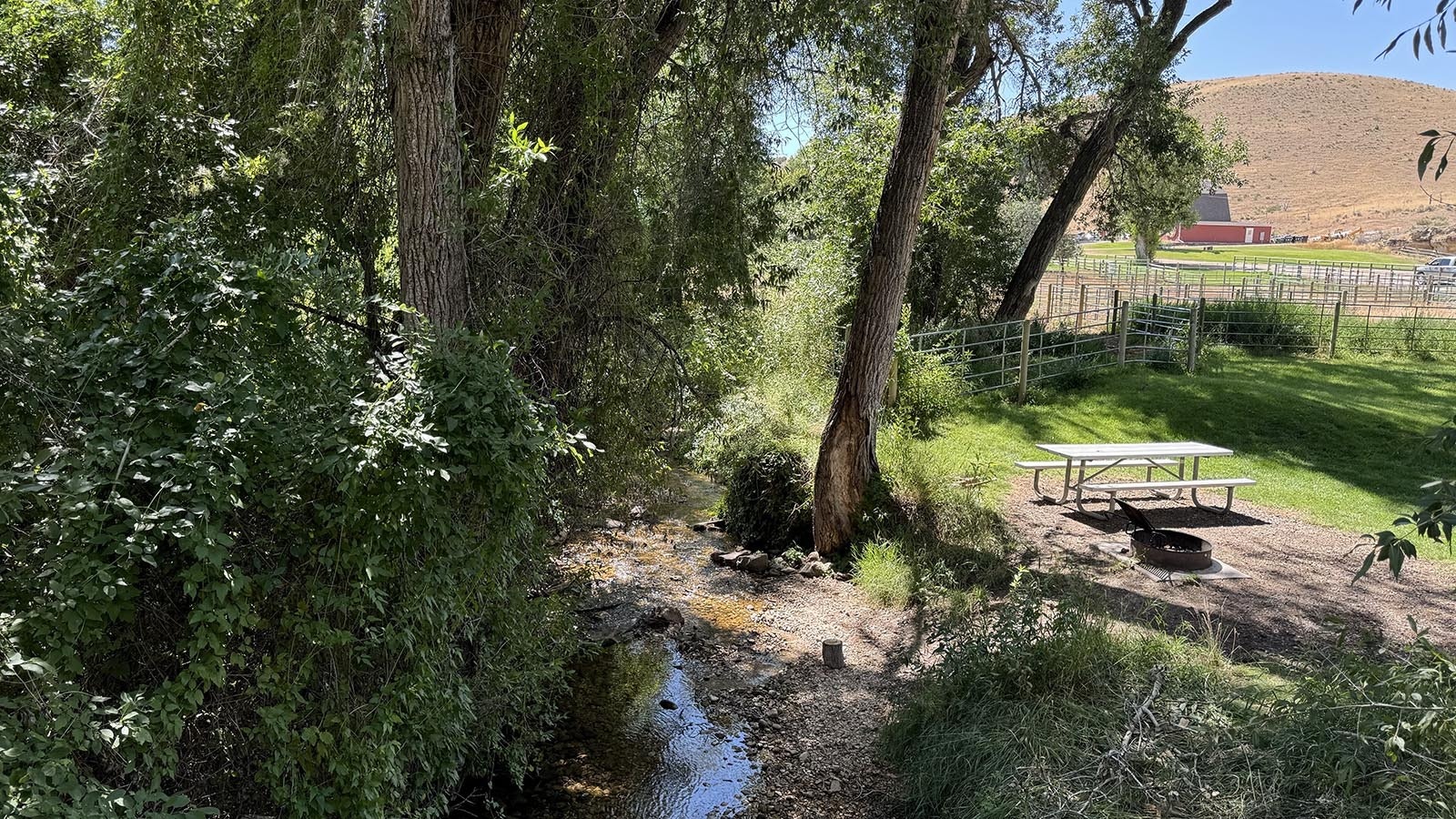 The Medicine Lodge Creek with the Medicine Lodge Archaeological Site Visitor’s Center in the background.