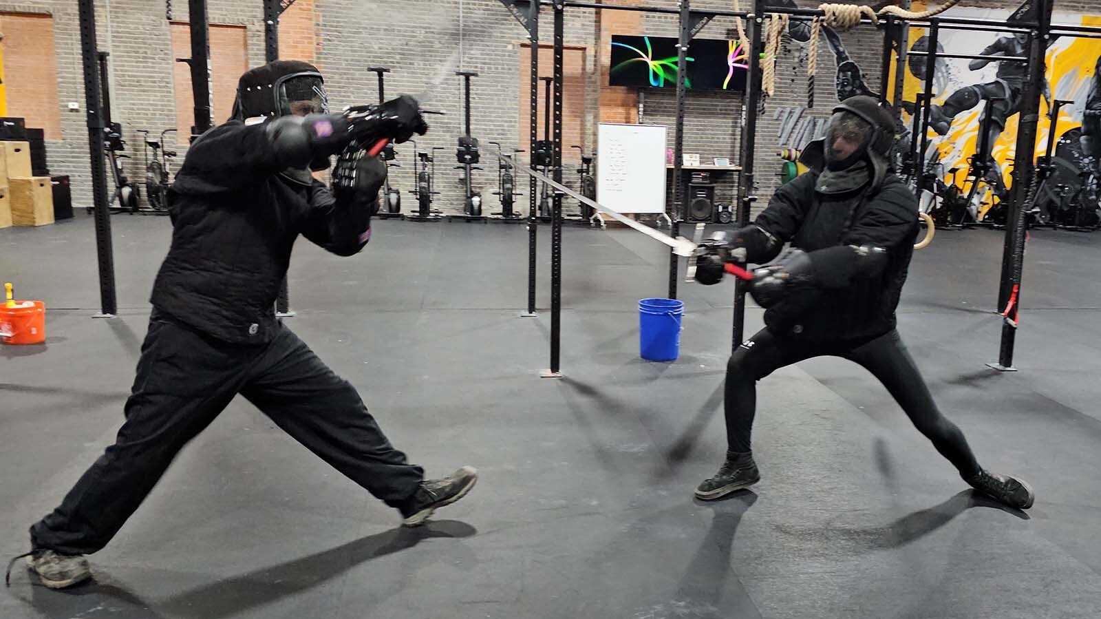 Two participants in class spar a little during a historical European martial arts class in Cheyenne.