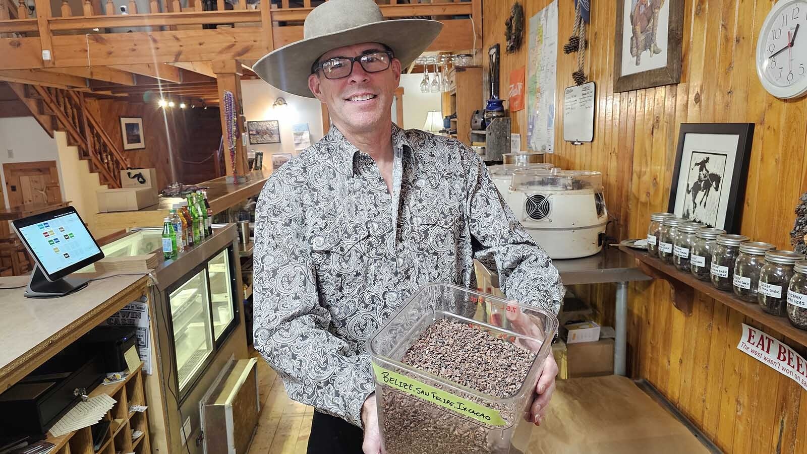 Meeteetse Chocolatier Tim Kellogg offers a smell some of his favorite cacao nibs.