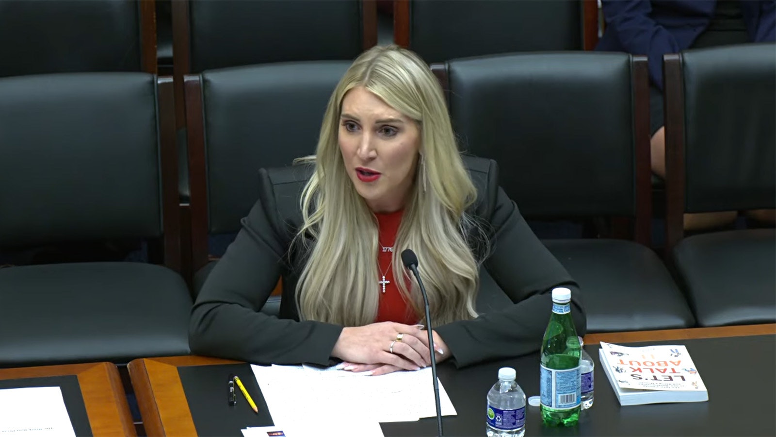 Wyoming Superintendent of Public Instruction Megan Degenfelder testifies for the U.S. House Subcommittee on Early Childhood, Elementary and Secondary Education about the issue of sexually graphic books in public schools. Next to her is one of those books that has been challenged in Wyoming, "Let's Talk About It" by Erika Moen and Matthew Nolan.