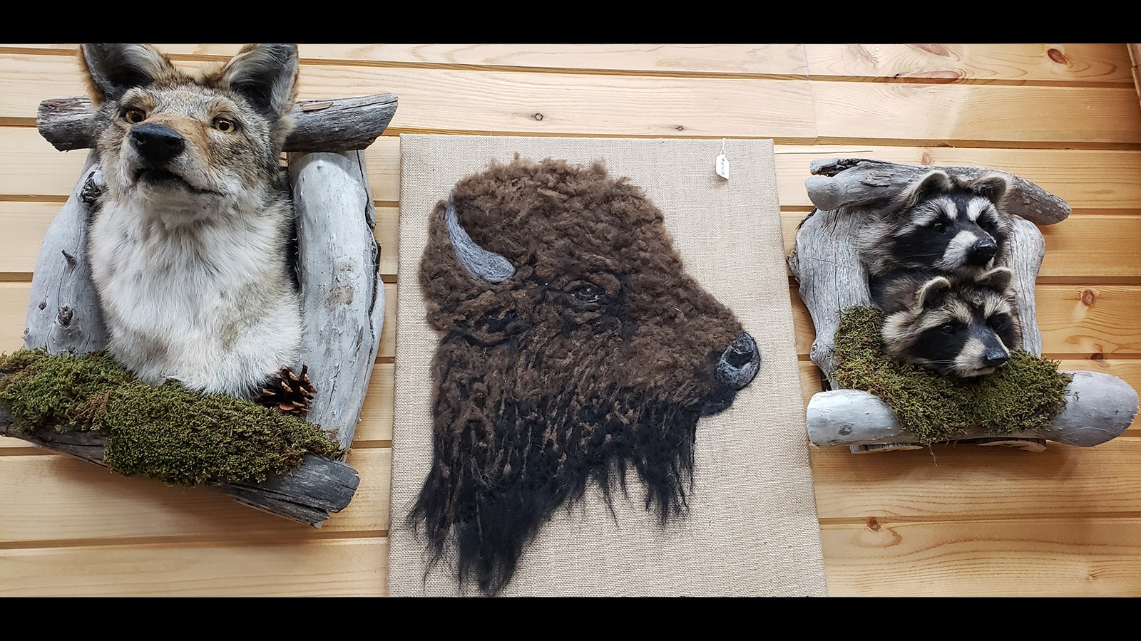 The buffalo in the center was composed using actual buffalo fur.