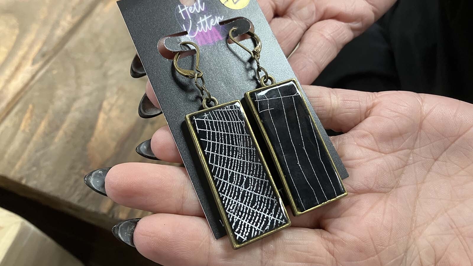 Metalmark Studios offers earrings made using real spiderwebs.