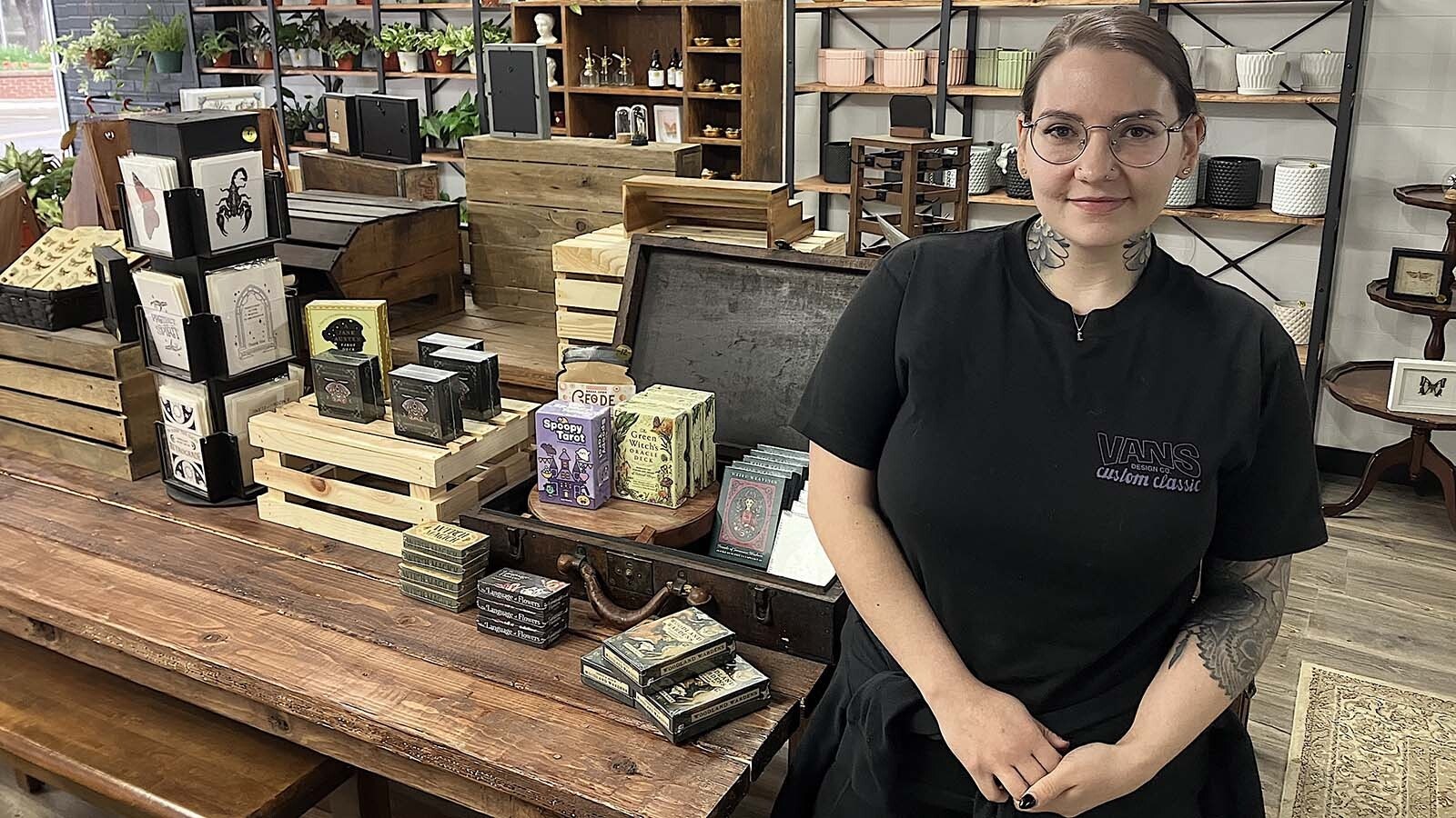 Kinzie Calvert poses in the store portion of Metalmark Studios in Casper.
