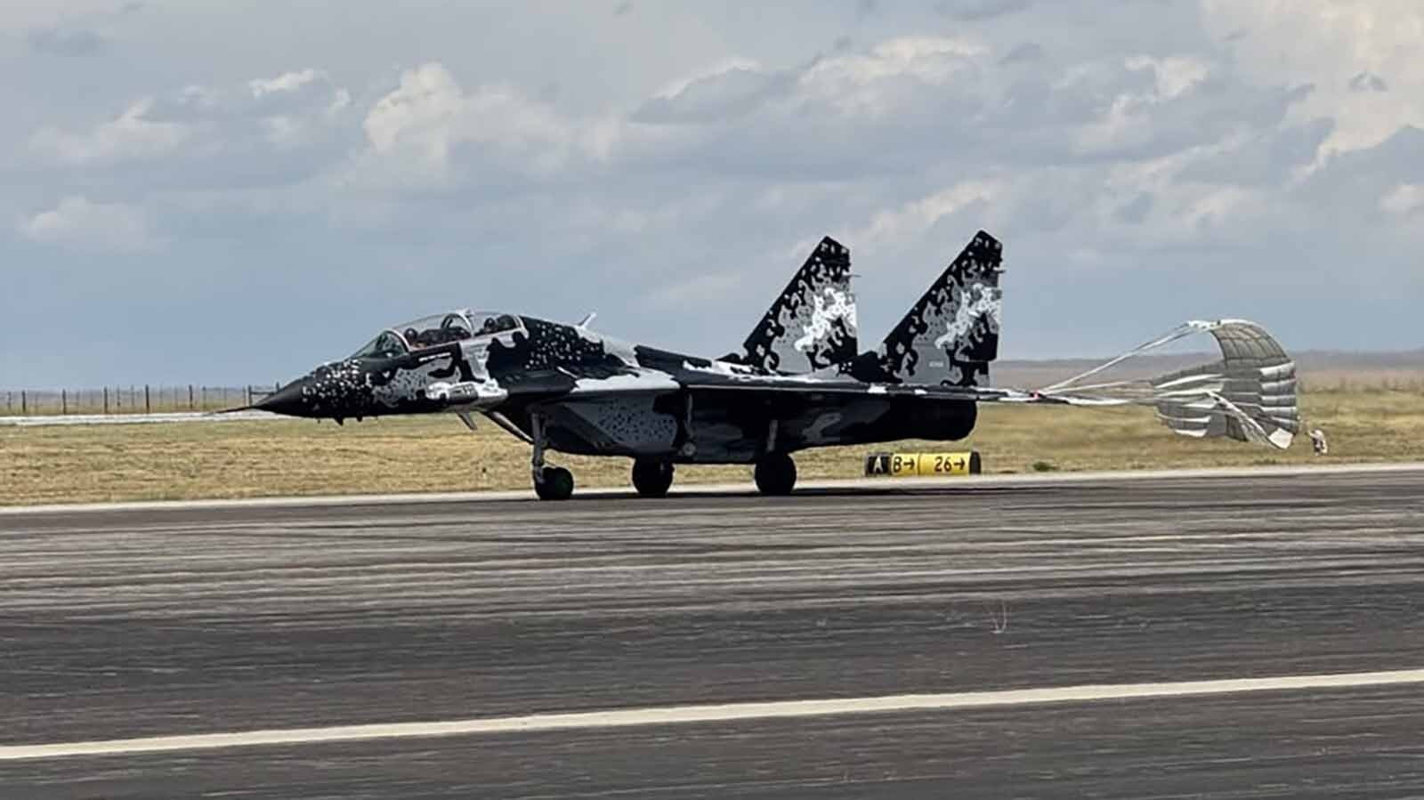 A MiG-29 deploys a chute as it lands at Casper/Natrona County International Airport on Wednesday, July 23, 2025.