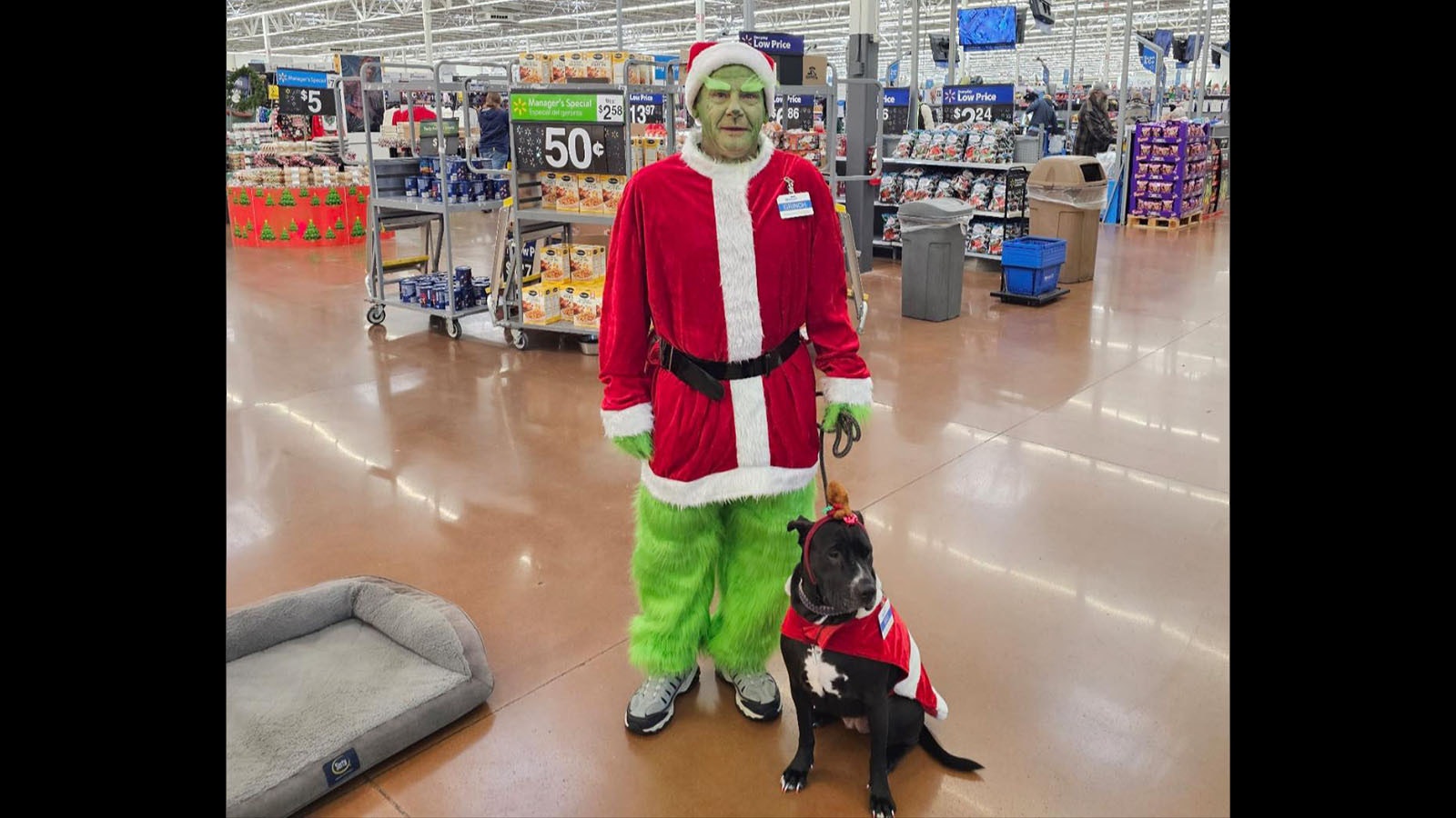 Billy Welch and Mia greeted customers at Walmart during the Christmas holidays in their special costumes.