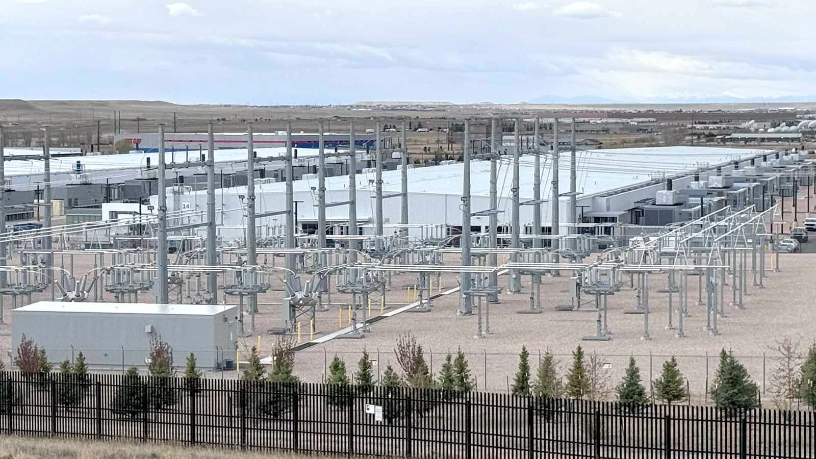 Microsoft announced Tuesday that it will buy 3,200 more acres in Cheyenne to build data centers, tripling its footprint in Wyoming's capital city while promising to limit impacts on power rates, water and housing. Above is Microsoft's data center in the Cheyenne Business Parkway business park in east Cheyenne.
