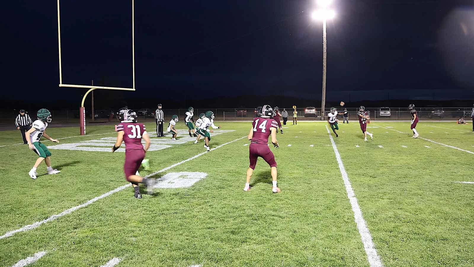 The Midwest Oilers take the ball in for a touchdown on a pass play.