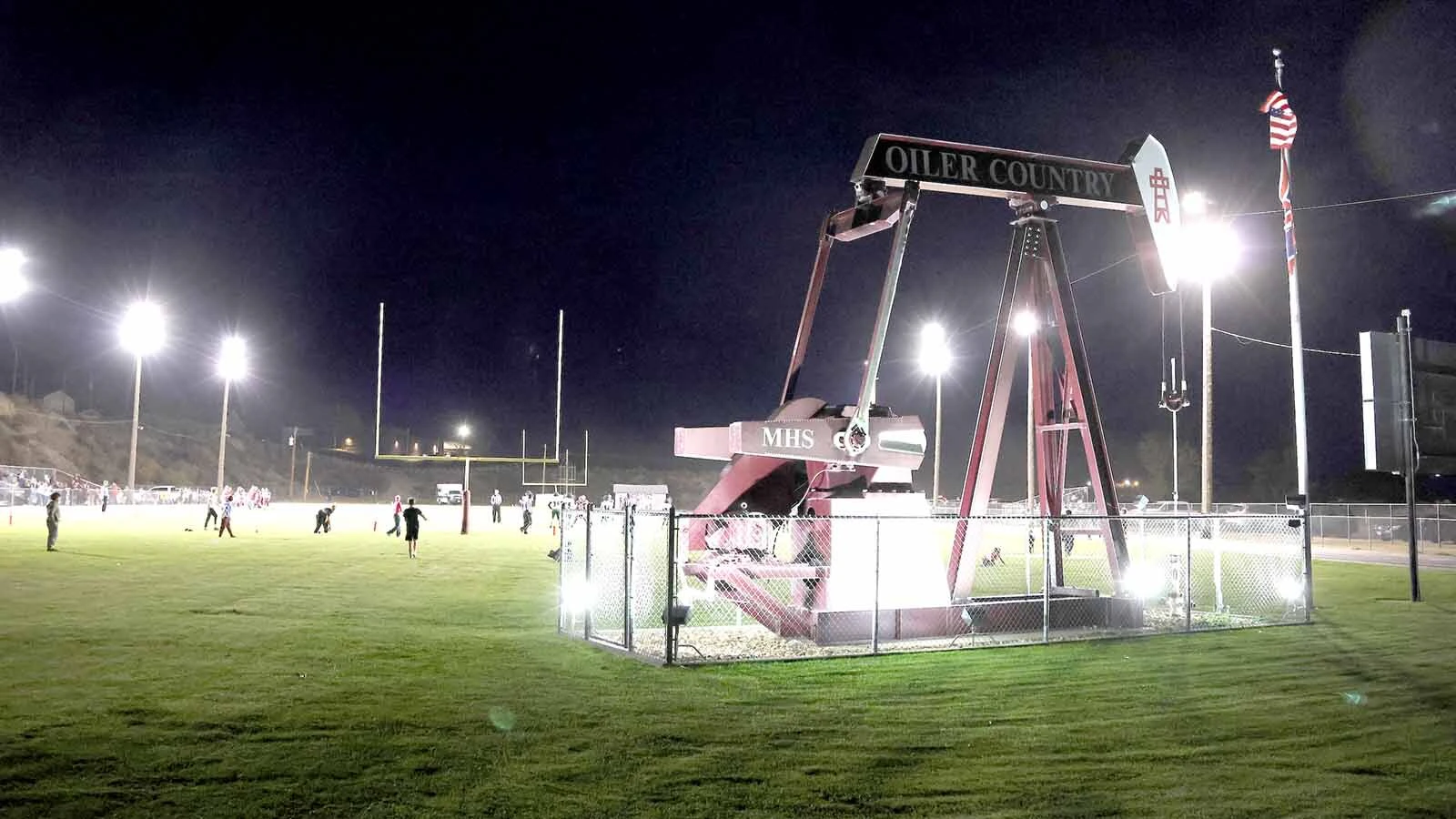 Football under the lights Thursday represents the 101st year since Midwest school had the first high school game in the nation under the lights in 1925.