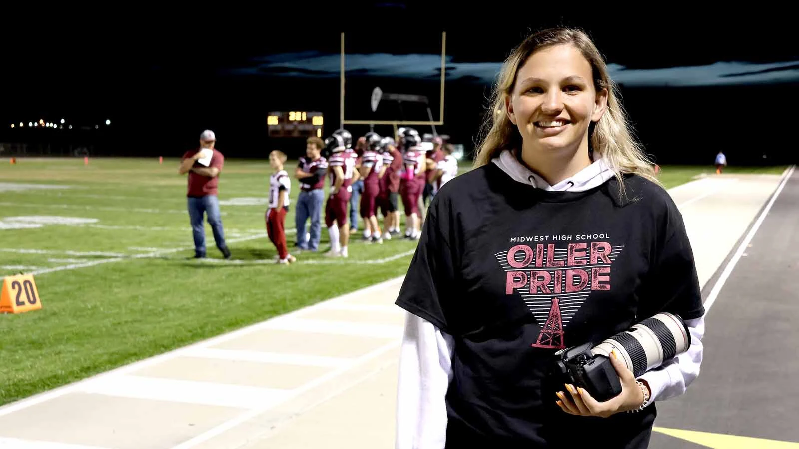 Trinade Jost graduated from Midwest High School and was at the game taking photos and cheering on her brother.