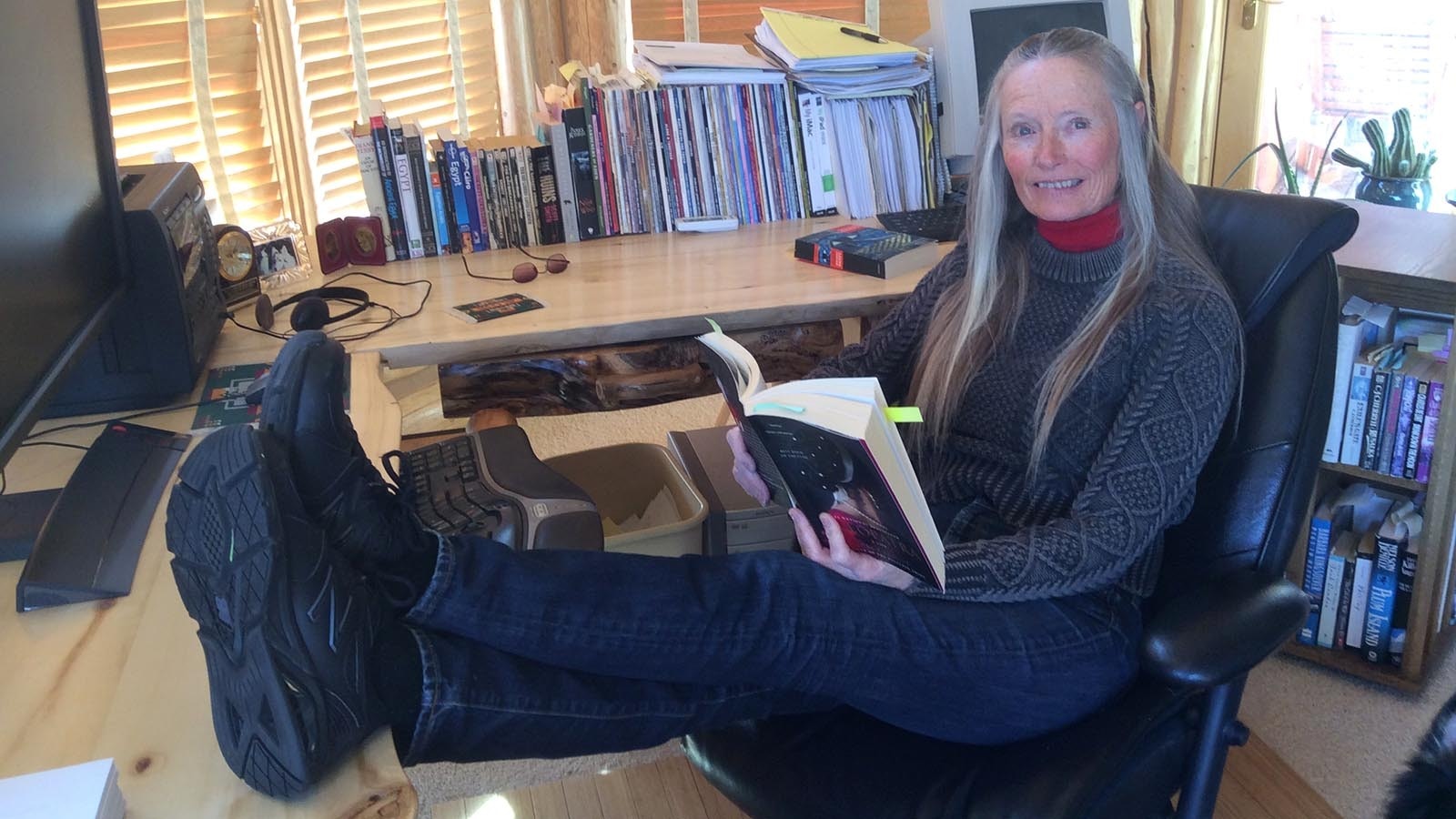 Kathleen Gear at her desk, researching for "Cries from the Lost Island."