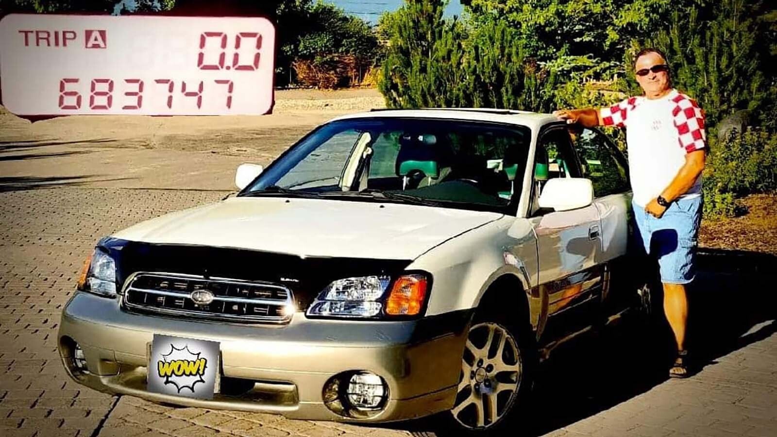 Here is Marty Simonich when his 2001 Subaru Outback Legacy sedan hit almost 700,000 miles. It’s now approaching a million as he continues his many journeys, which include trips to Wyoming through snowstorms and around northern Utah where he lives.