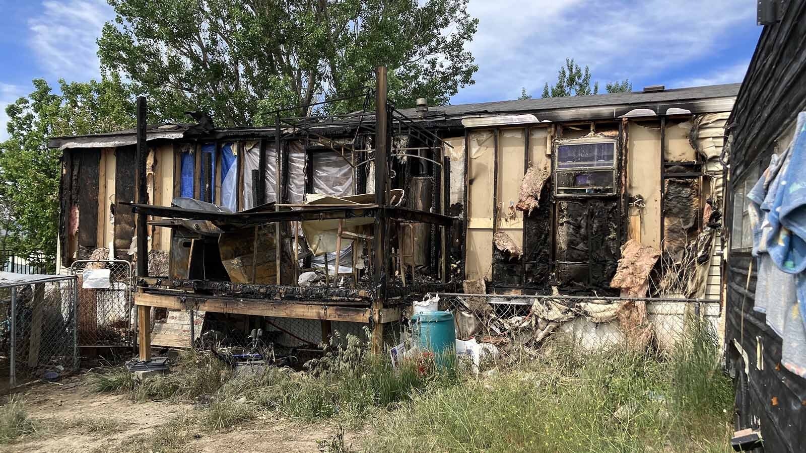 A Mills mobile home that housed an extended family of five suffered extensive damage in a Monday morning fire. The family lost much of their possessions and are trying to figure out next steps.