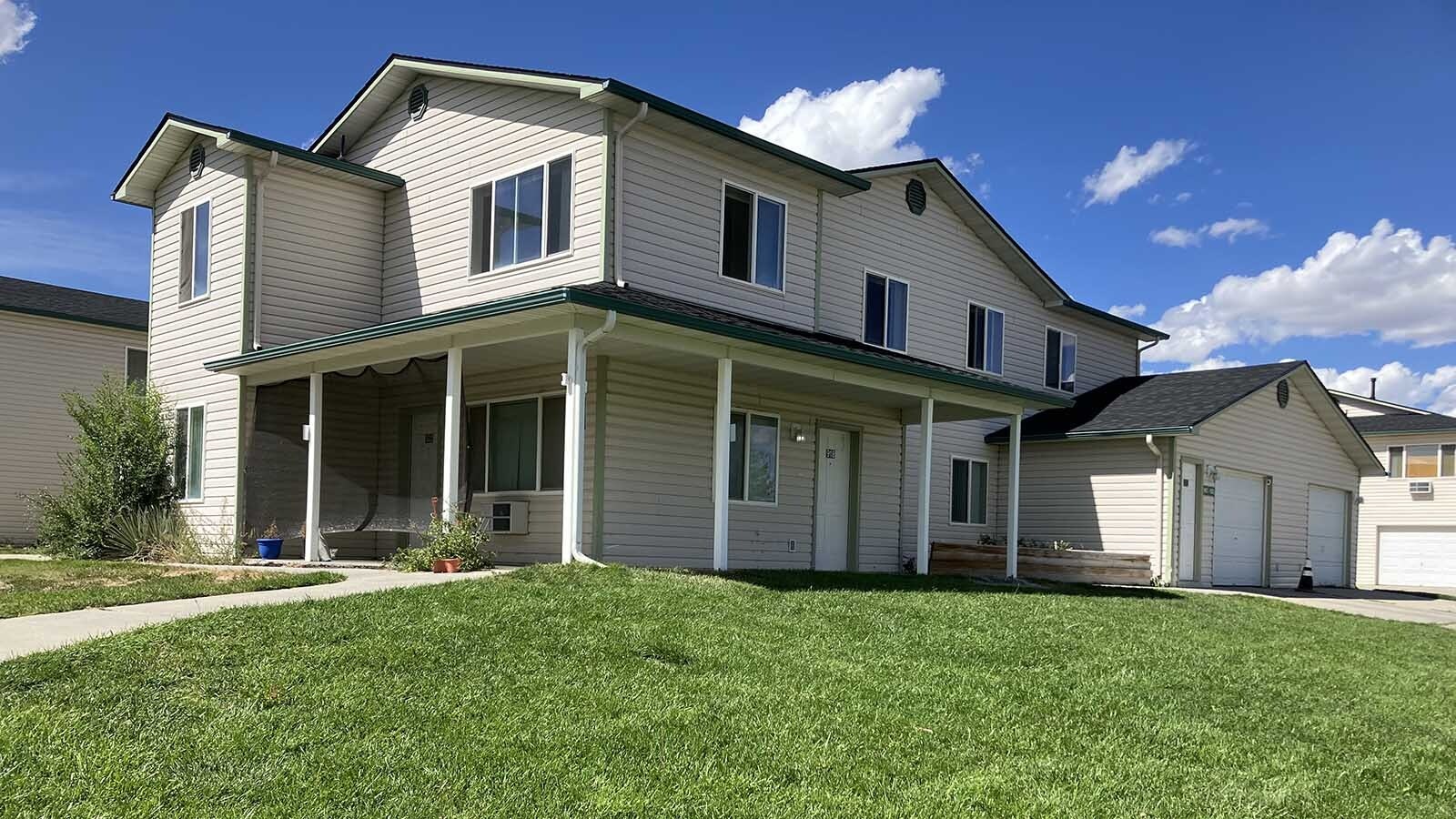 The apartment home across the street from where the standoff took place on Wednesday was a subject of court action involving Zachary Thomas Albrecht.