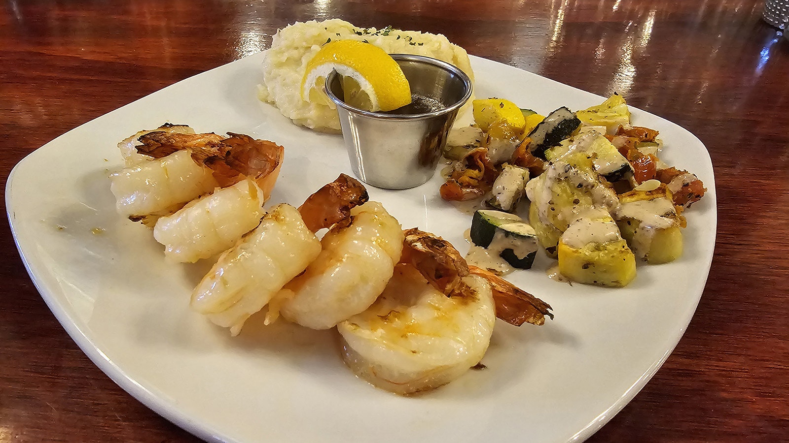 Steaks aren't the only thing available at Miners and Stockmen's Steakhouse in Hartville. Shrimp are also available, along clarified butter and seasonal vegetables in a cream sauce.