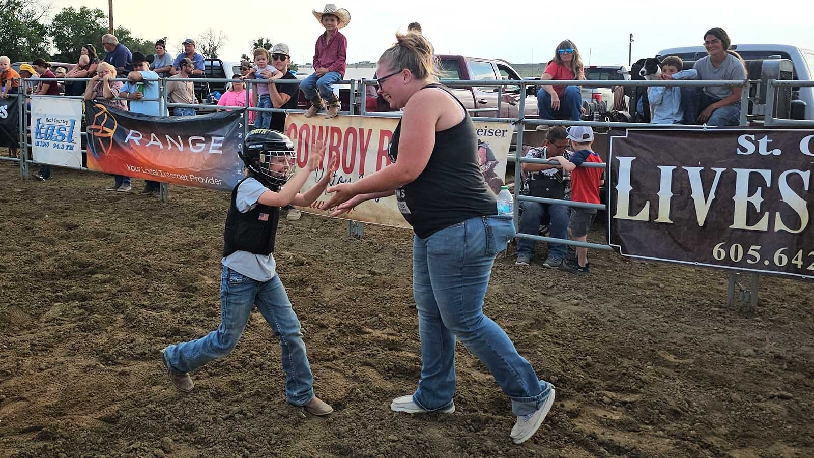 Gemma-Anne Haynes had high fives for her mom Angel after the mutton-busting event.