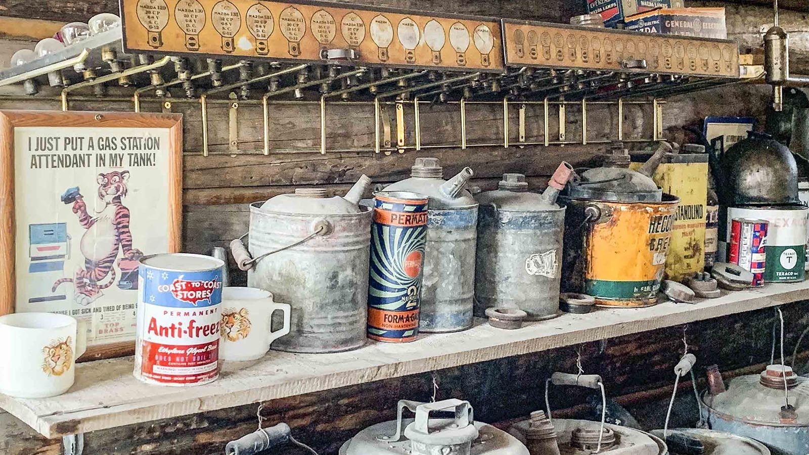 A collection of old oil and gas cans at the Miracle of America Museum in Polson, Montana.